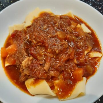 slow-cookedbeef brisket ragu on a plate with pasta