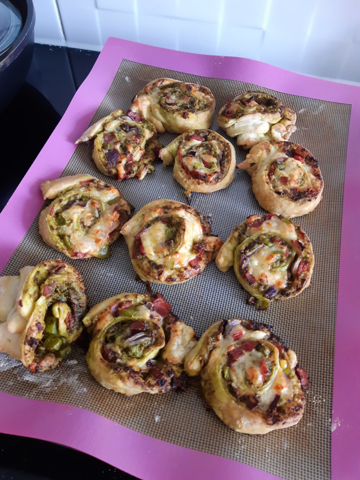 pesto rolls on a baking tray