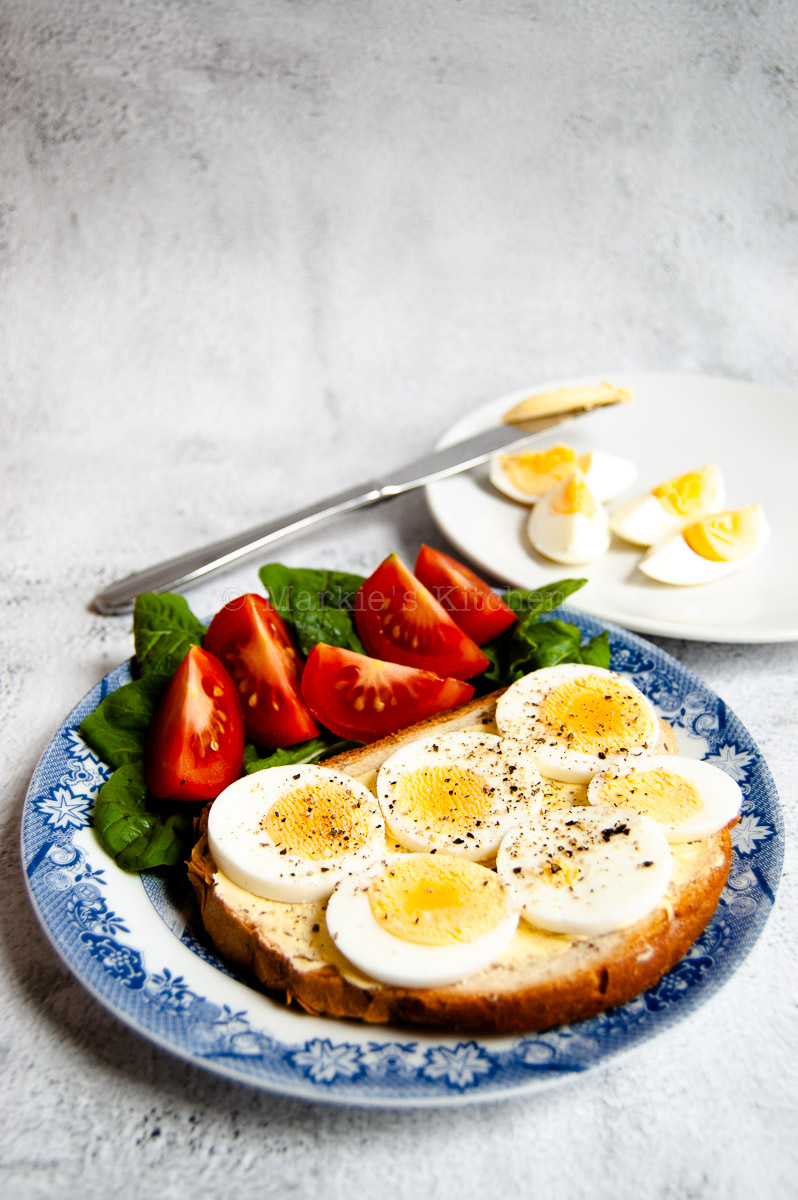 Sandwich with boiled eggs and salad